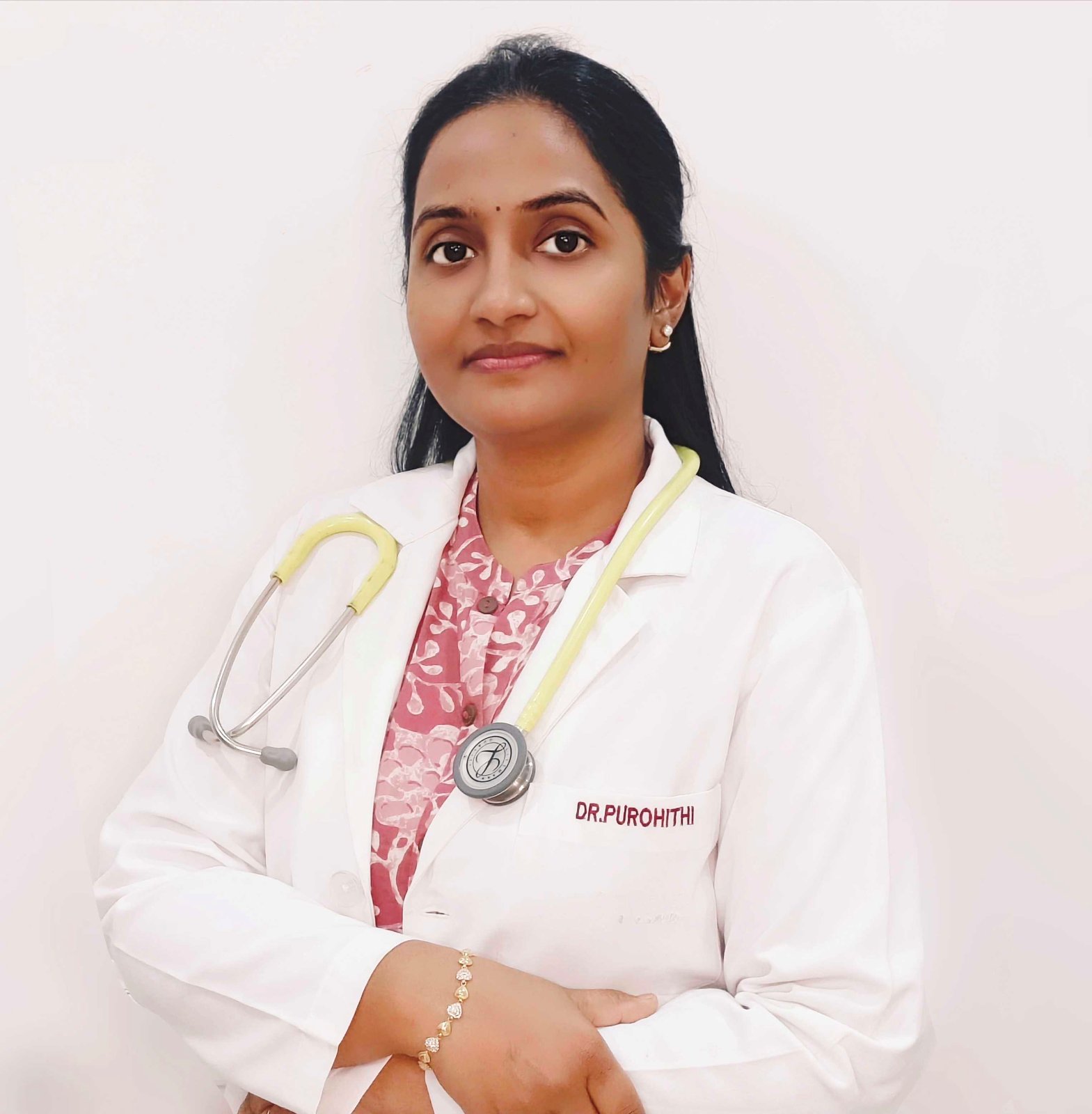 Dr P. Purohithi, pain management specialist, in a white coat